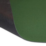 Close-up of a green cricket mat with rubber backing, designed for indoor and outdoor use